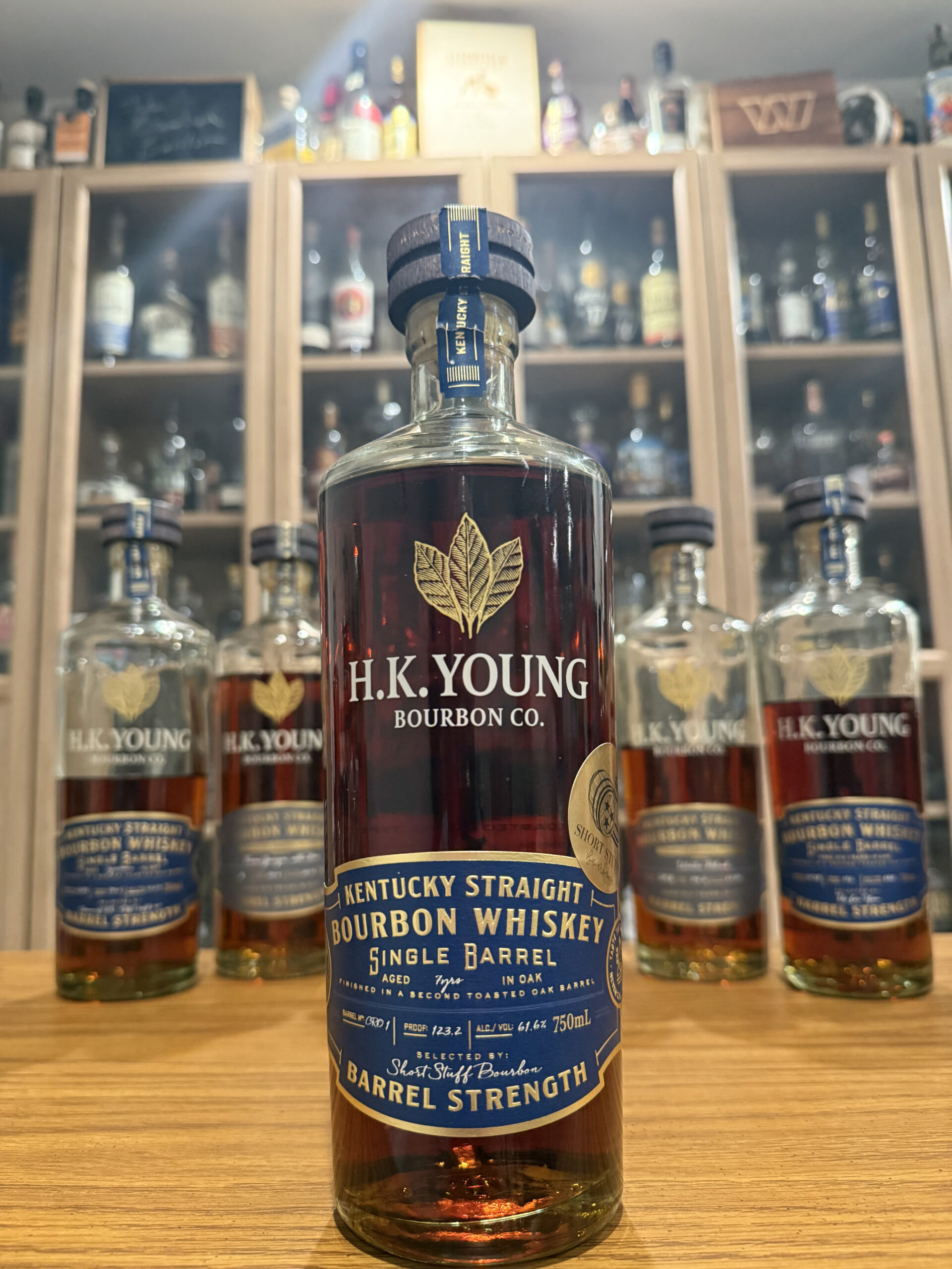 H.K. Young High Rye Toasted Bourbon Shortstuff Bourbon Single Barrel (123.2 Proof) Pick with past releases behind it.
