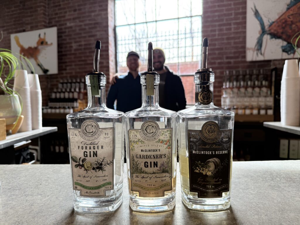 Mcclintock gin lineup in front of Alex and E.S. Pope blurred.