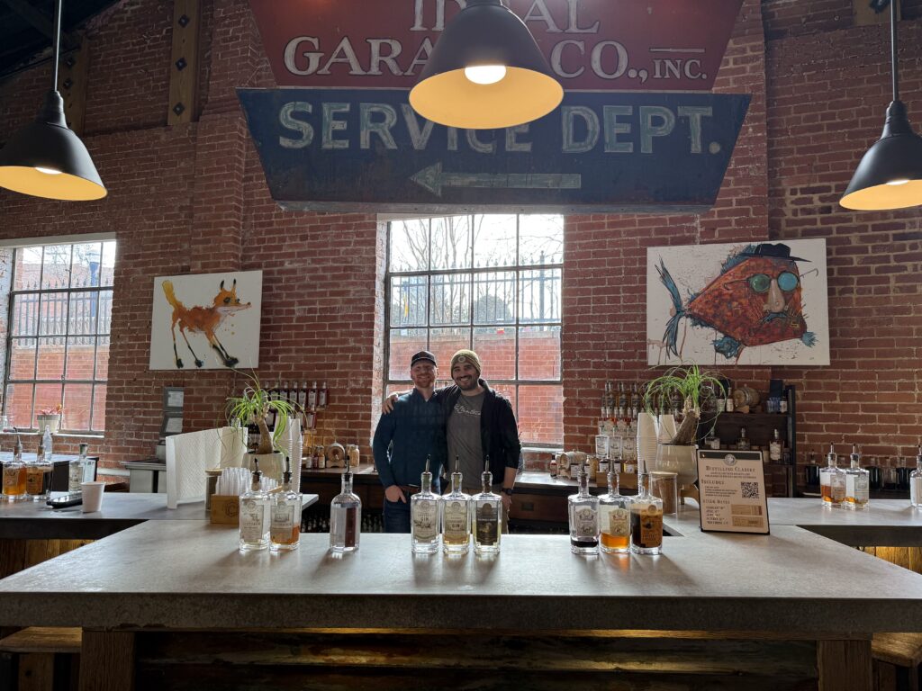 E.S. Pope & Tasting room manager Alex in Mcclintock tasting room.