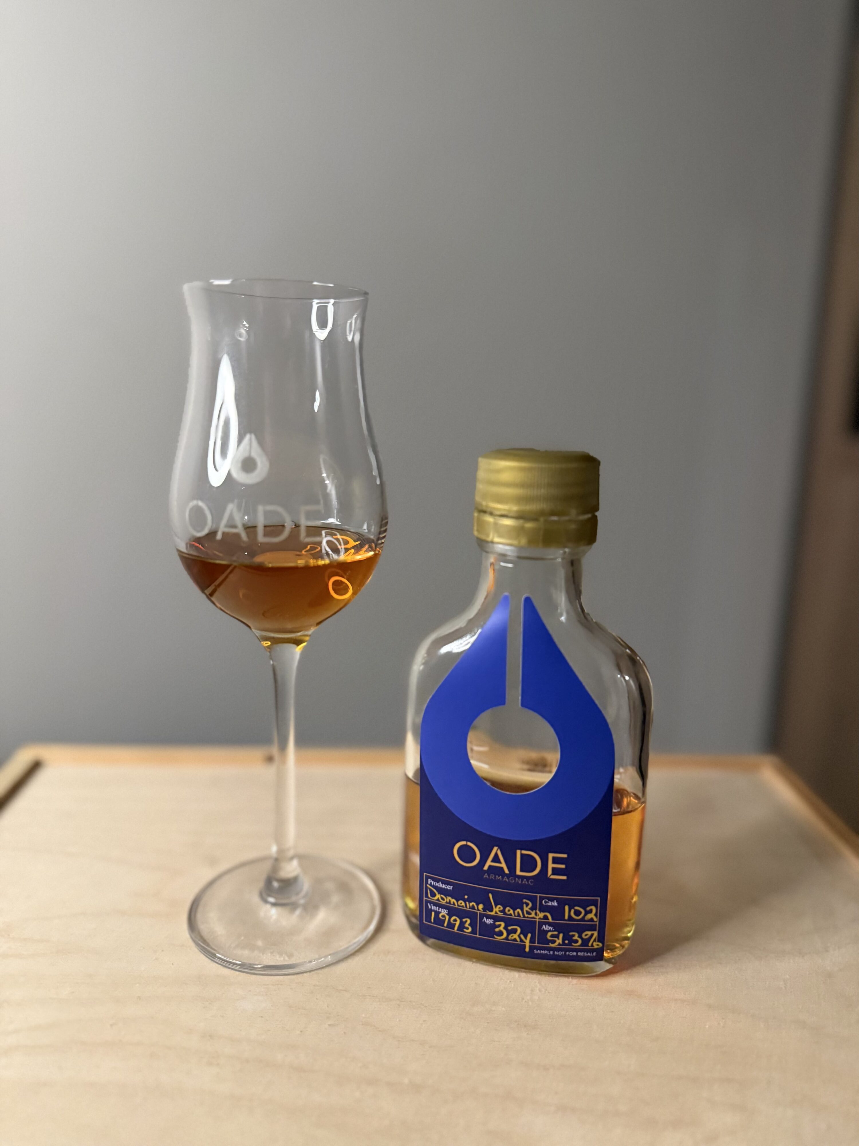 Oade Armagnac Domaine de Jean-Bon sample beside Oade tasting glass