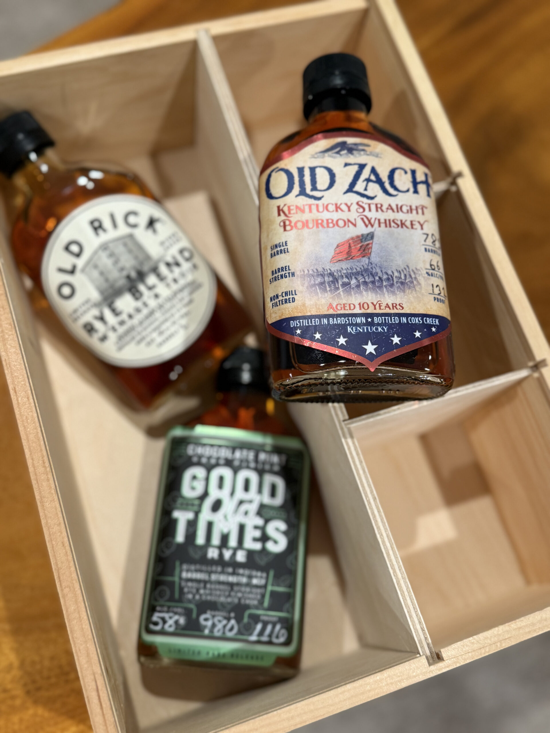 Old Zach 10 Year Kentucky Bourbon Single Barrel 132 Proof Visible with blurred samples from Old Rick and Good Times