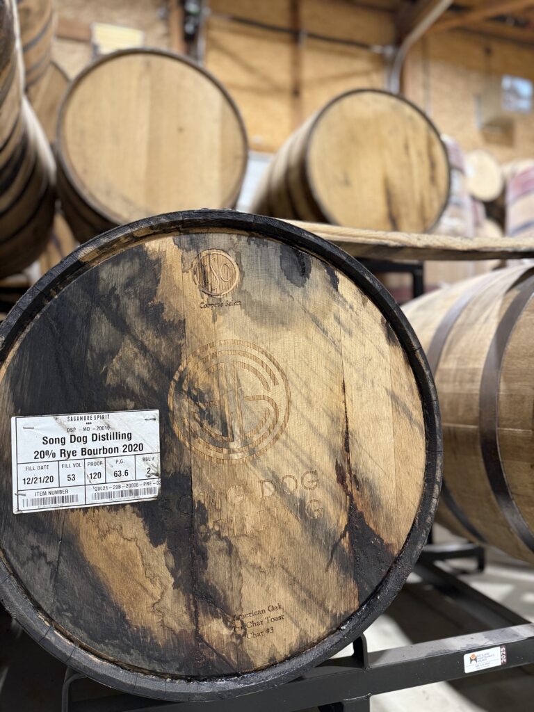 Song Dog well aged barrels in small storing facility