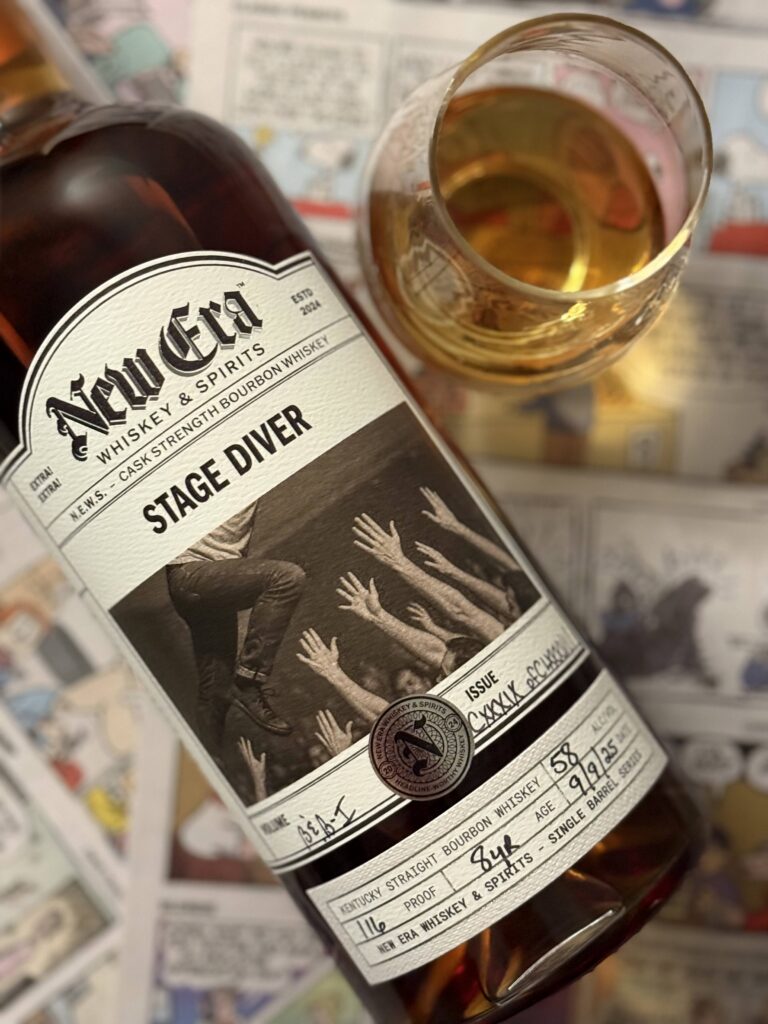 New Era Stage Diver Single Barrel zoomed in lying on colorful newspaper cartoons