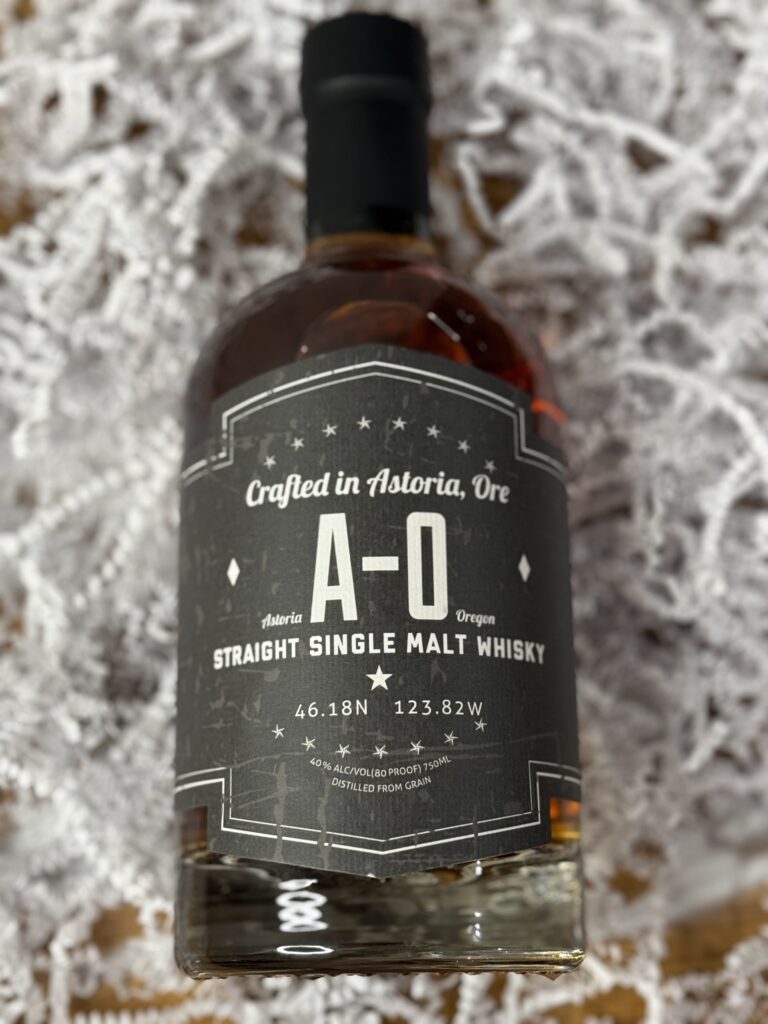 Pilot House A-O Single Malt Whiskey lying in white paper