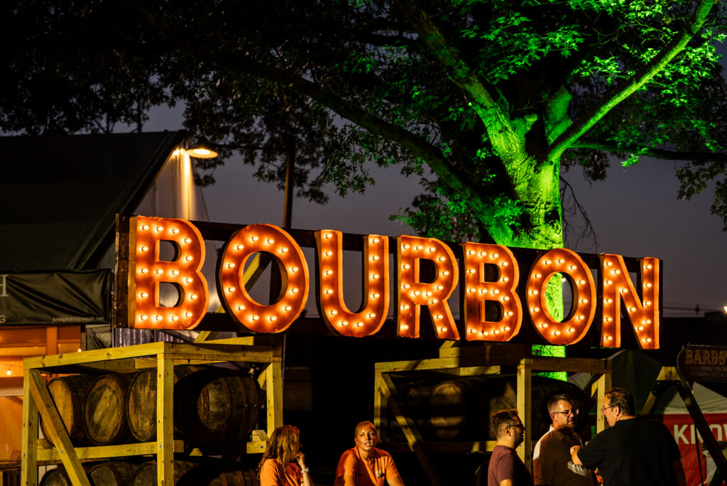 Bourbon in the Air event sign