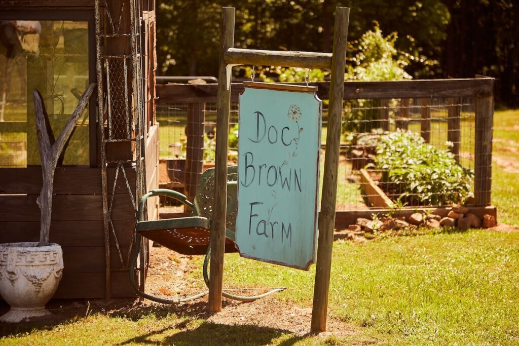 Close-up of Doc Brown Farm sign. Photo Credit: Styles Blueprint