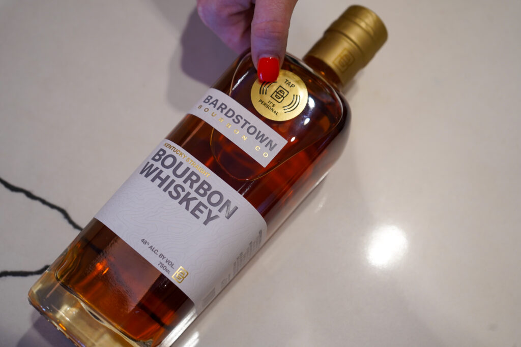 NFC tag sticker is placed onto Bardstown Bourbon Company Bottle