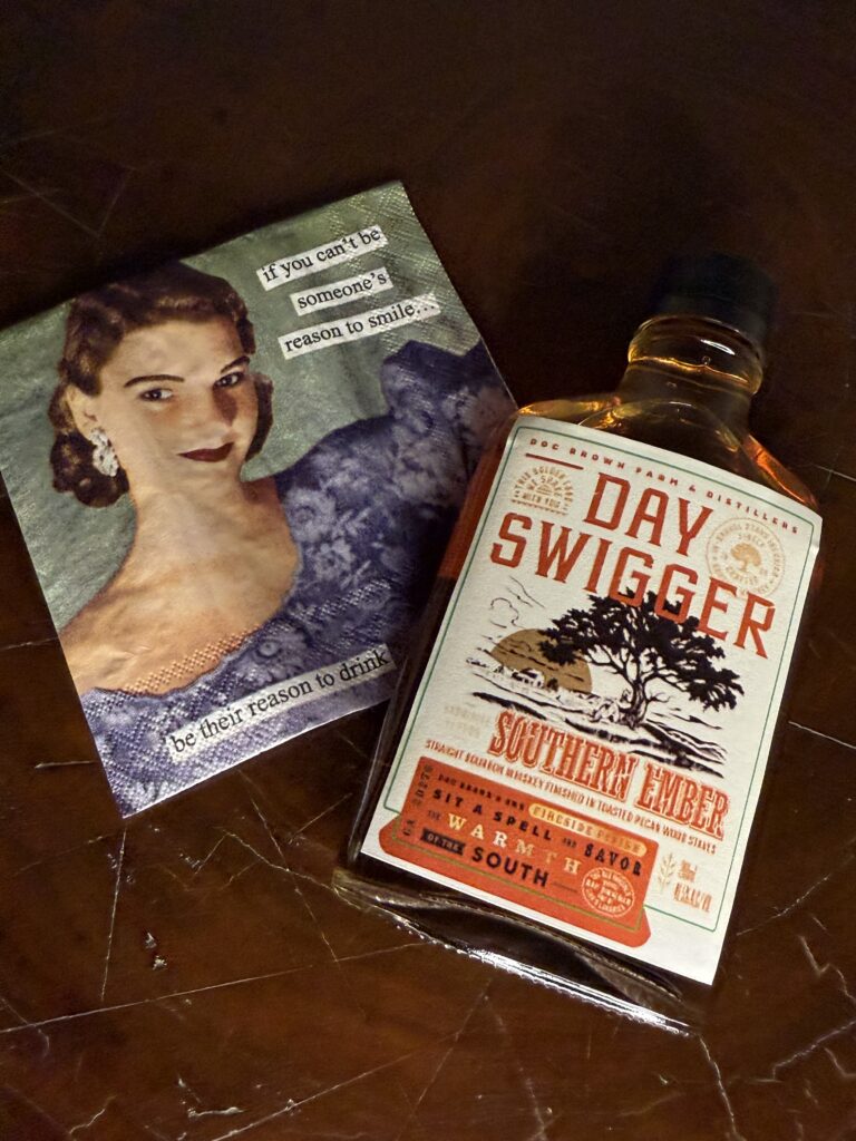 Doc Brown Day Swigger Toasted Pecan Bourbon lying on funny napkin