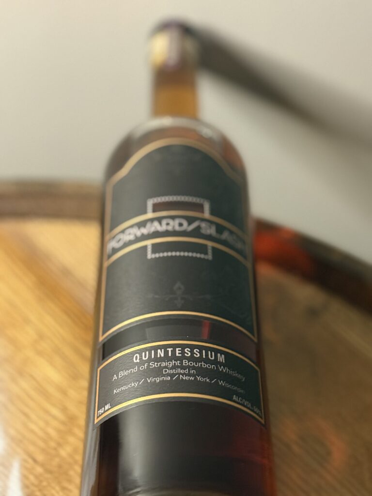 Forward Slash Quintessium bottom label focus