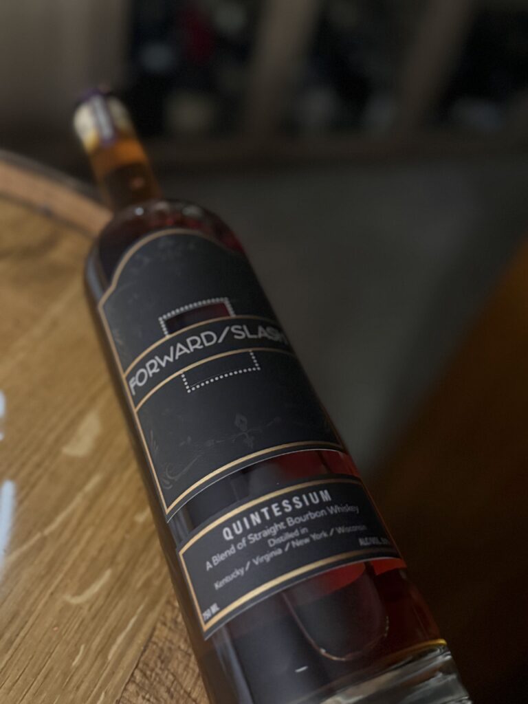 Forward Slash Quintessium lying on barrel