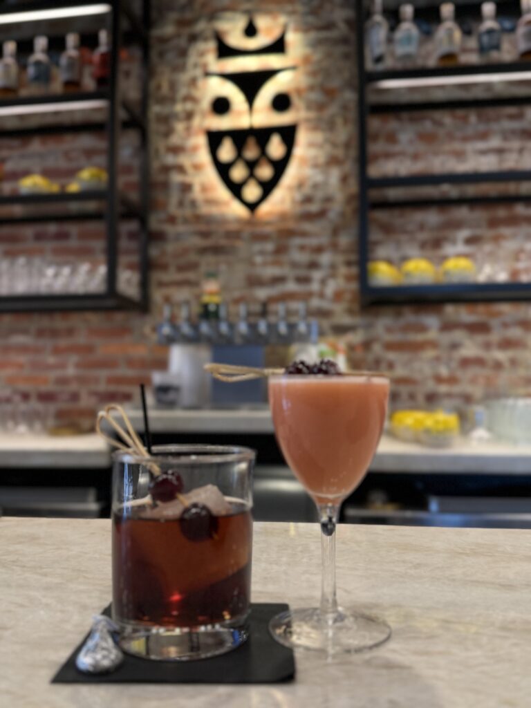 Cocktails sitting on bar in front of True Standard tasting room