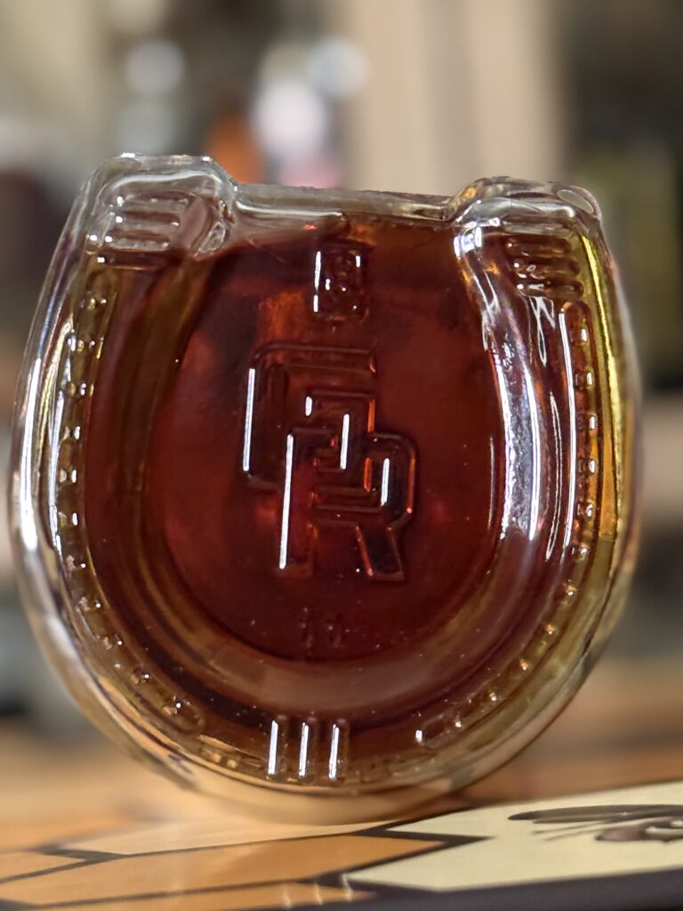 Green River Honey Bourbon embossed "GR" on bottom of bottle