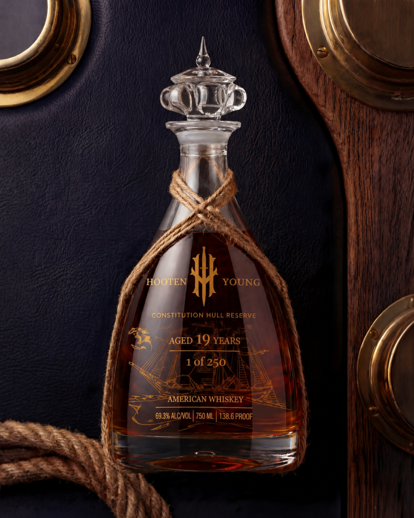 Hooten Young Constitution Hull Reserve bottle surrounded by nautical items