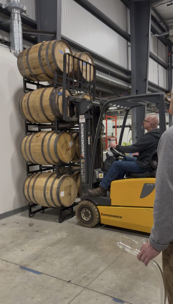 Forklift takes down barrels in Litchfield's rickhouse for our tasting