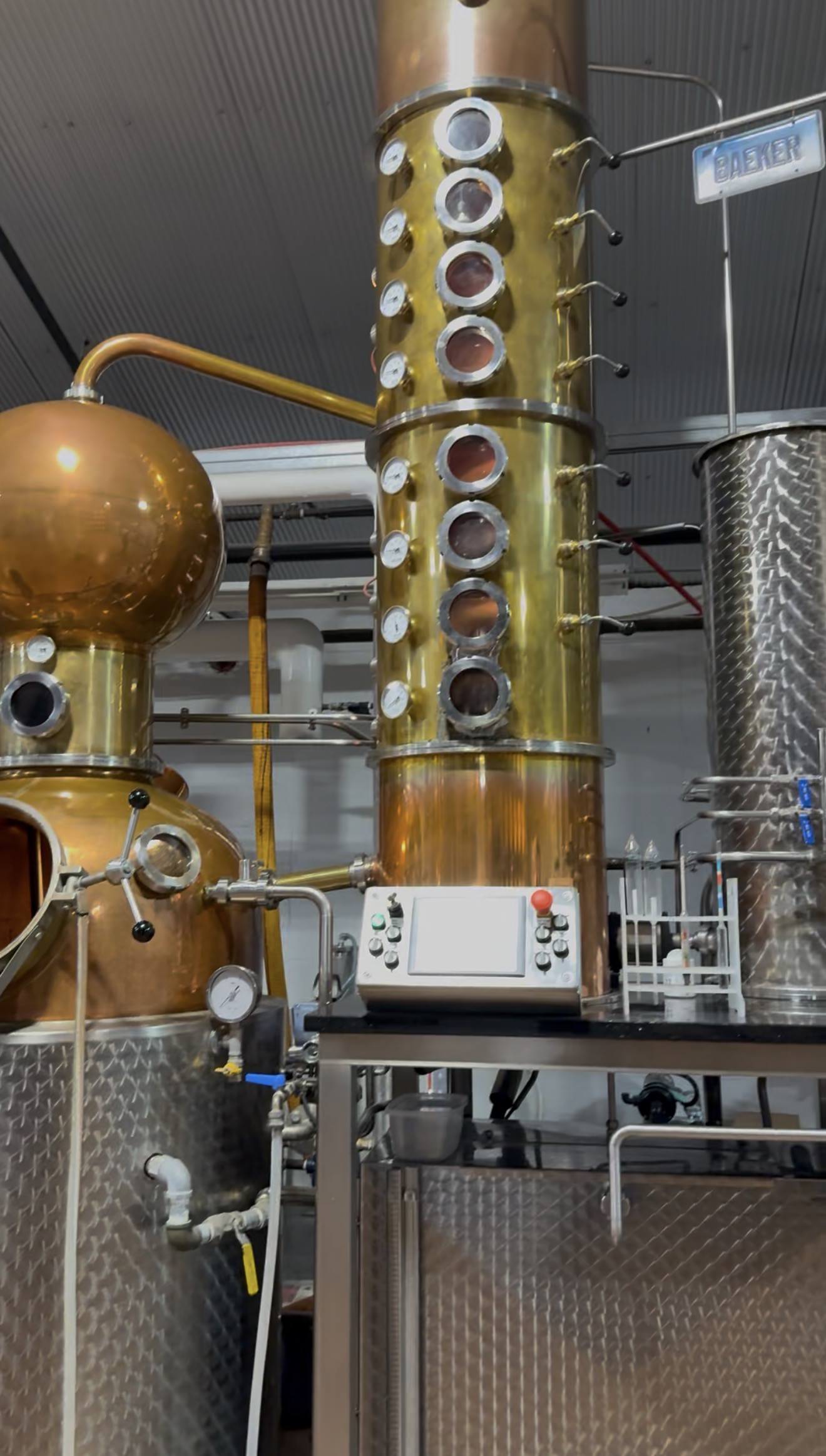 Litchfield Distillery's original hybrid still continues to live in the distillation room and be used at times. A license plate "BAKER" which belonged to the Baker brothers' mother hangs above.