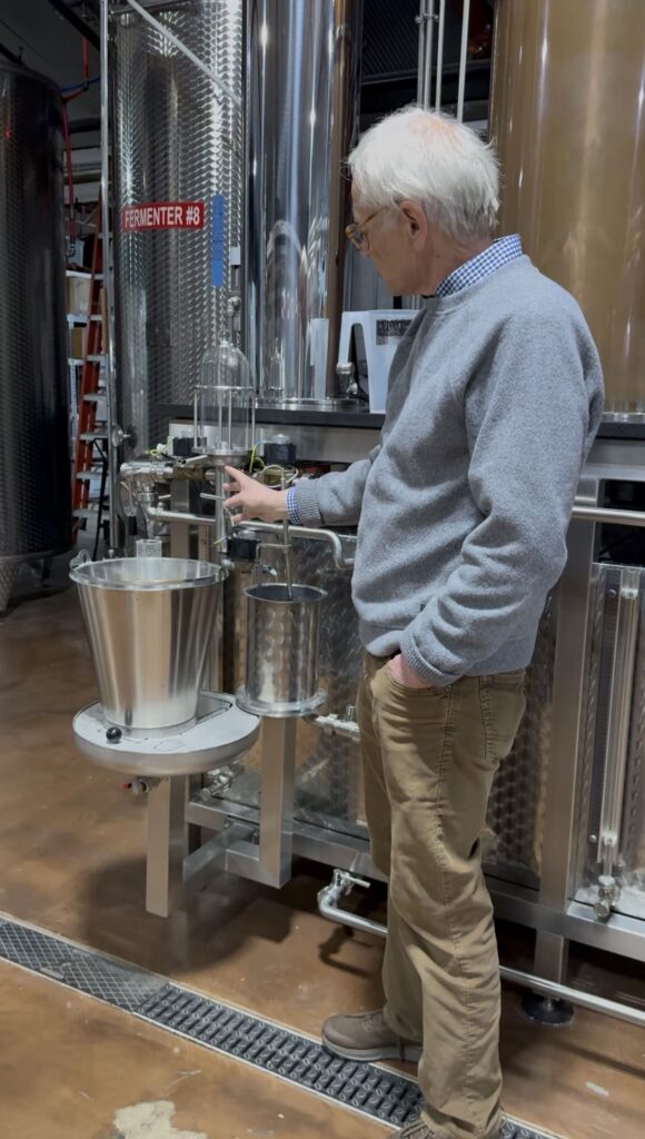 Litchfield owner Jack Baker explains the workings of their newer hybrid still