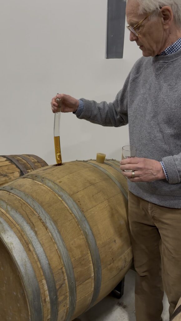 Litchfield owner Jack Baker thieves special whiskey barrel release for tasting