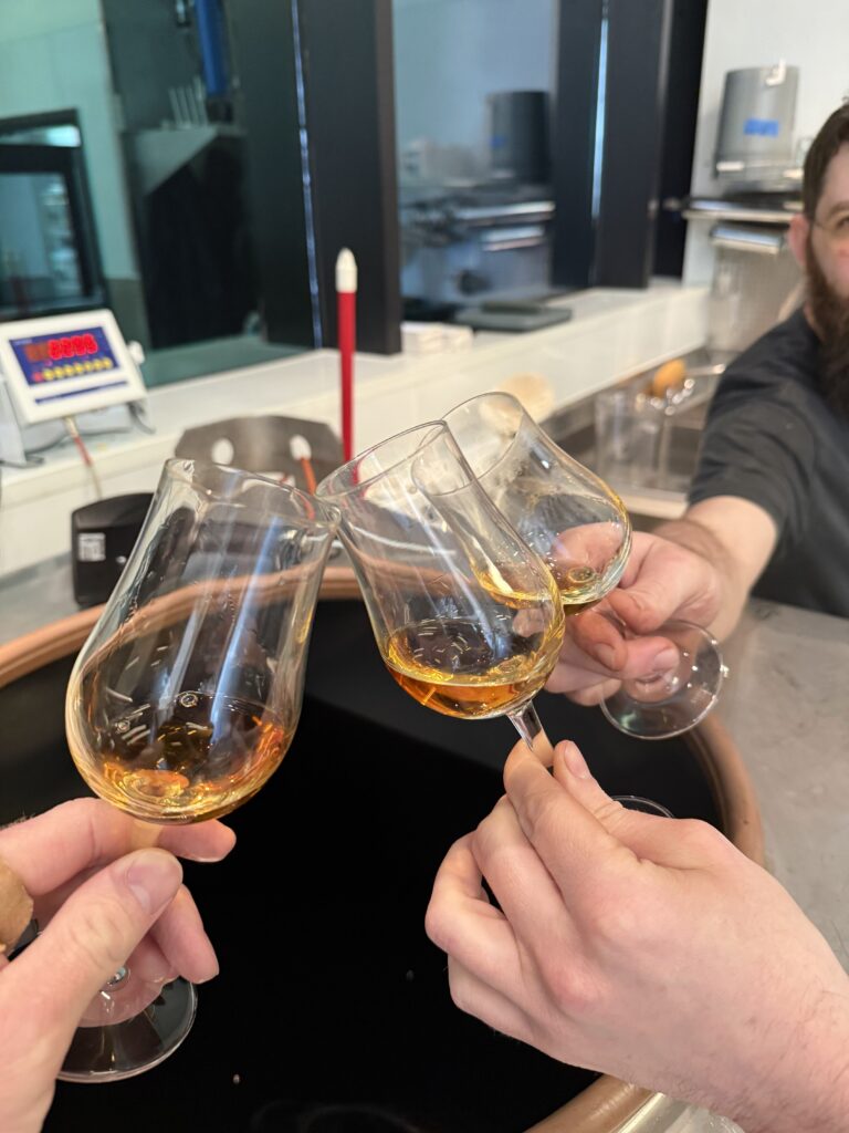 A final cheers between Ethan, Michael & Kirby to christen the final blend