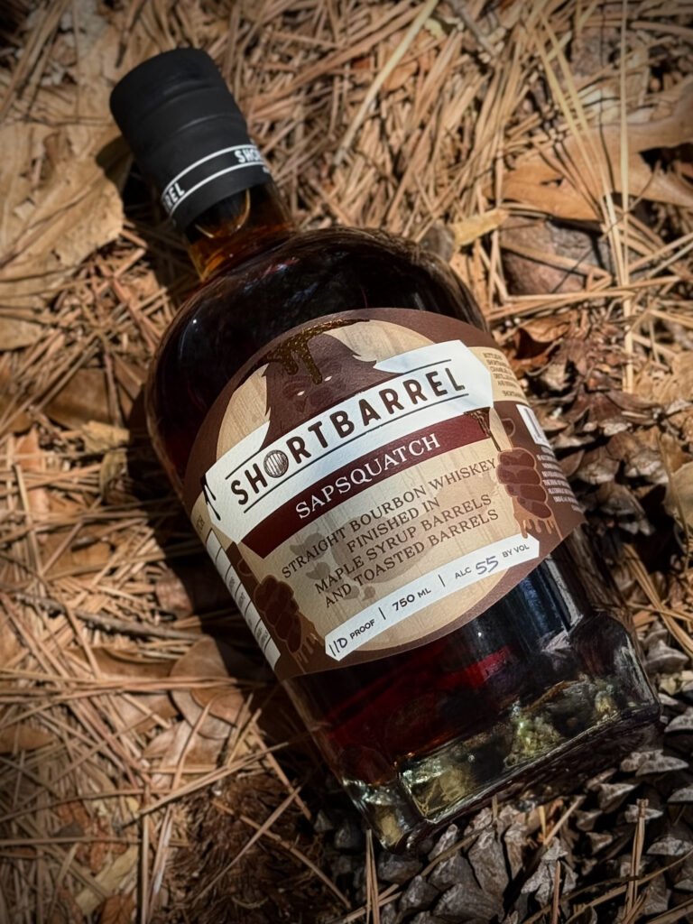Shortbarrel Sapsquatch lying on pine needles