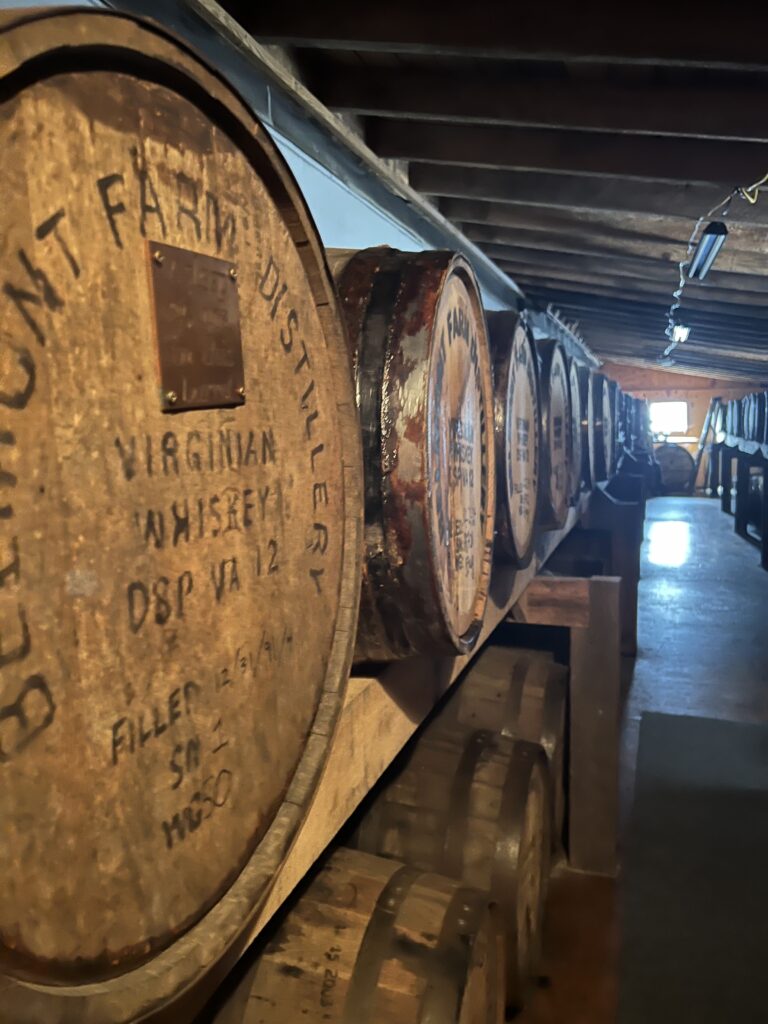 Barrels line long, short rickhouse hallway at Belmont Farms