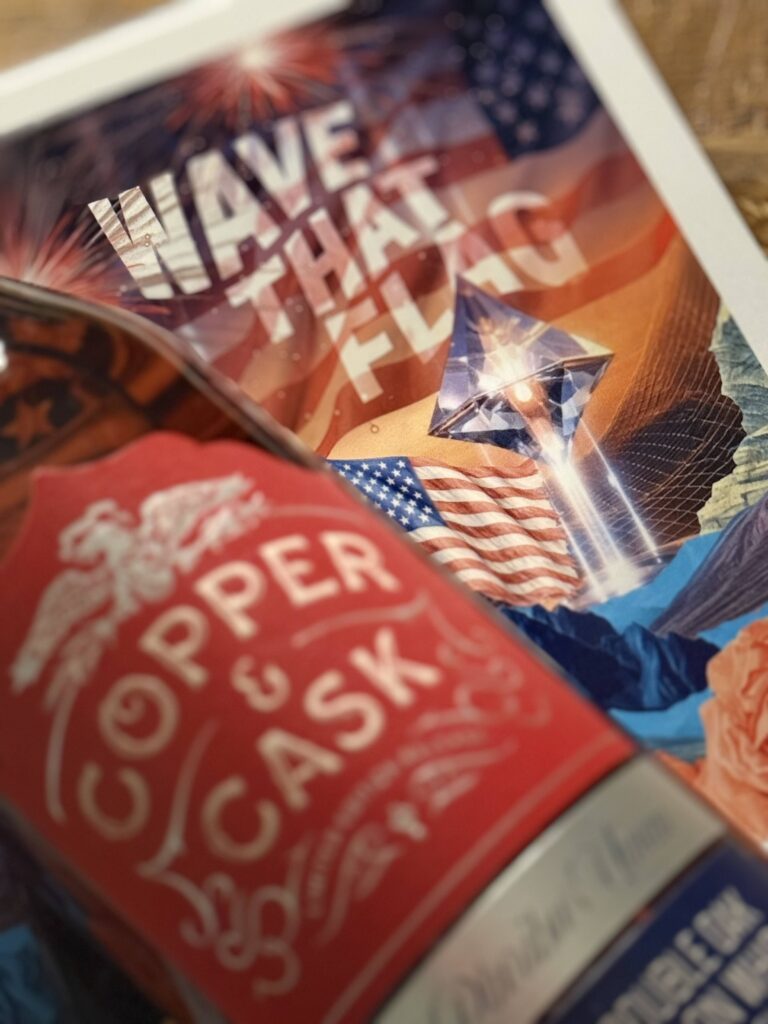 Copper & Cask "Wave That Flag" blurred against Wave That Flag art print