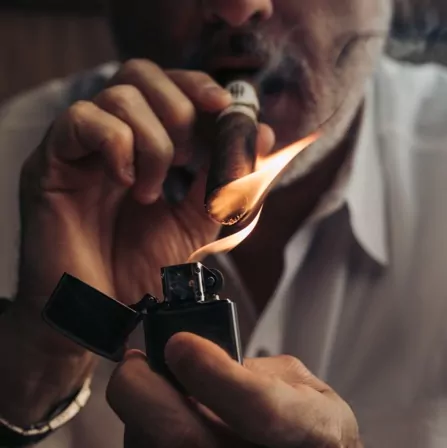 Hooten Young cigar is lit