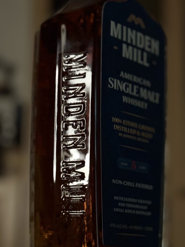Mindel Mill American single malt with distillery name embossed on side of glass