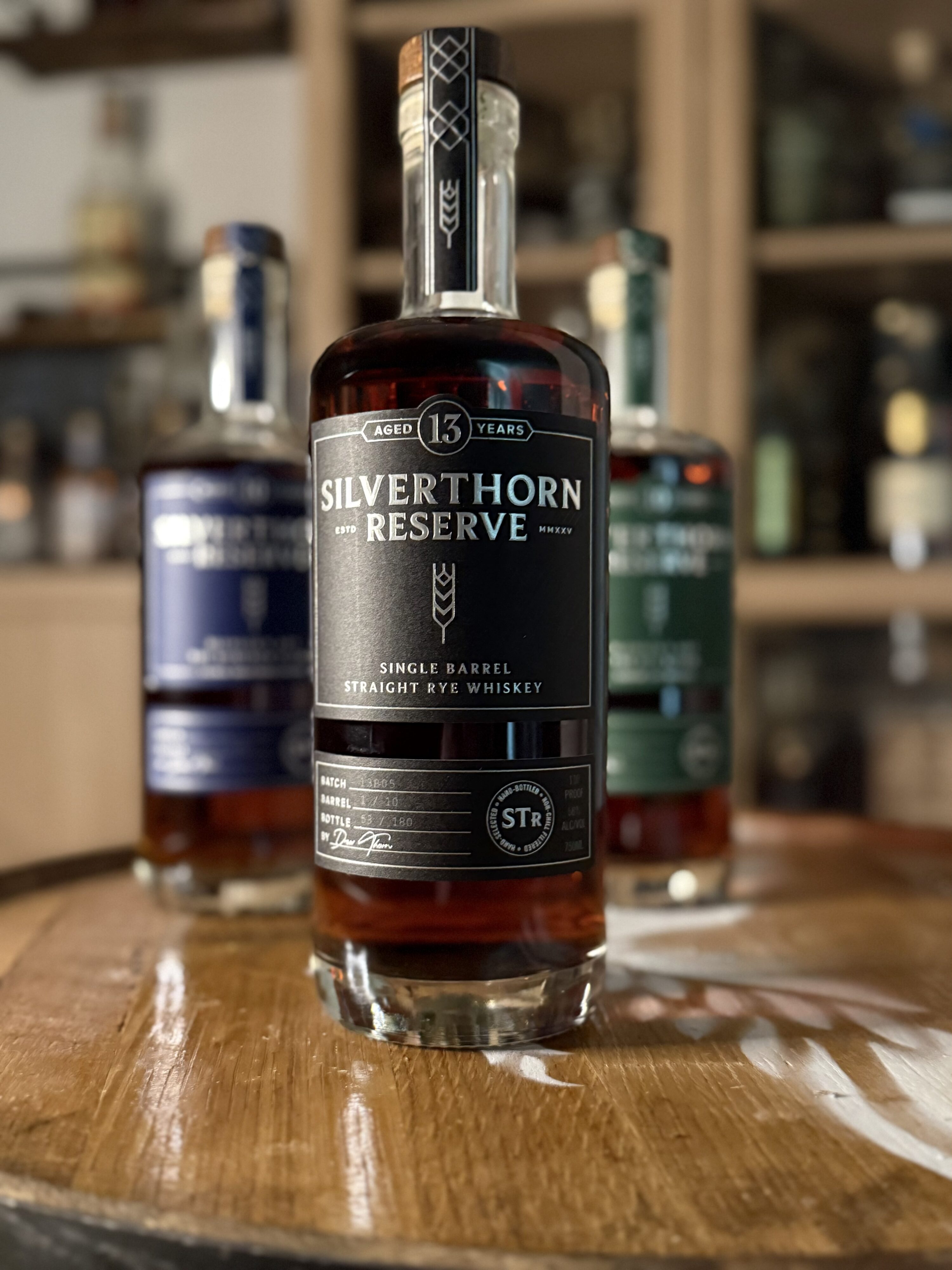 Silverthorn Reserve's new single barrel 13 year Rye stands tall in front of the two new 10 year blends