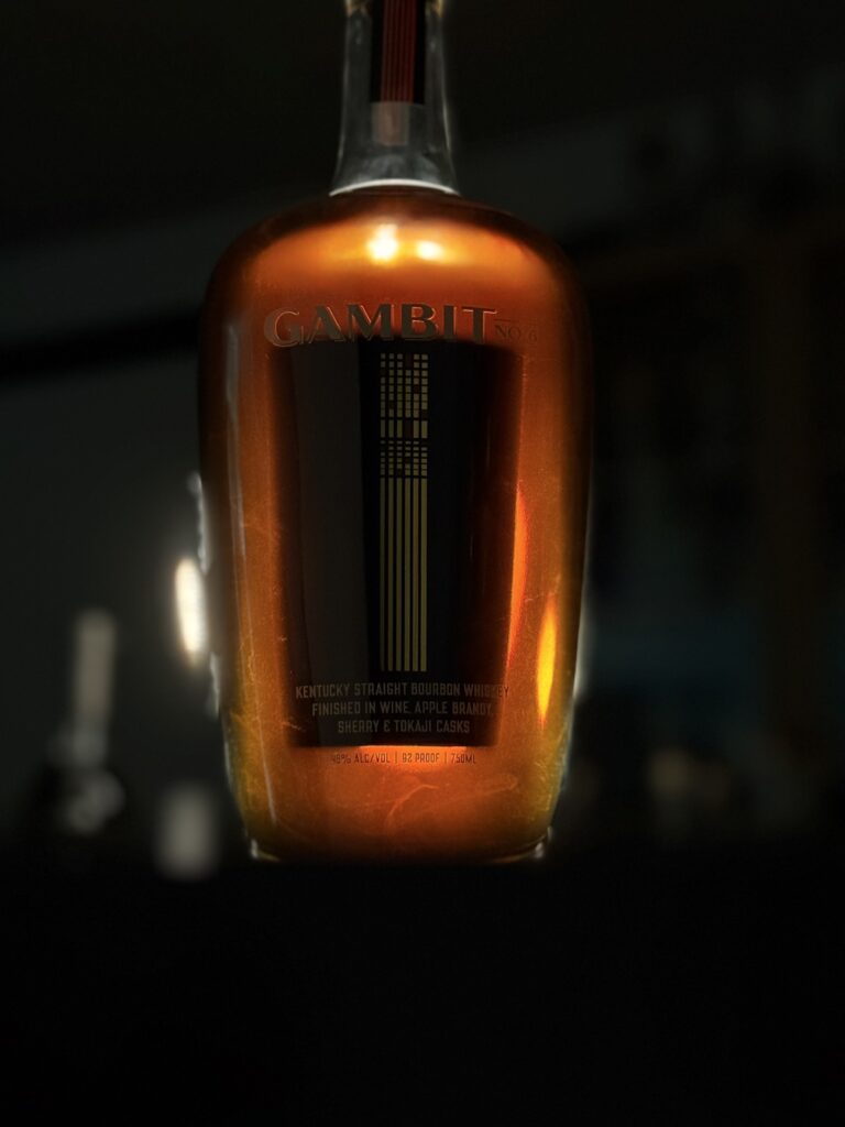 Gambit No. 6 backlit with darkness surrounding it