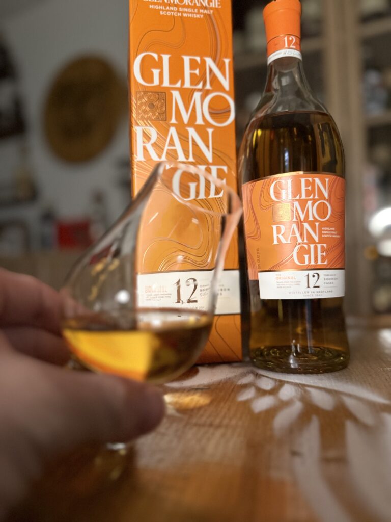 Glenmorangie "The Original" 12 Yr in glass in front of bottle and box