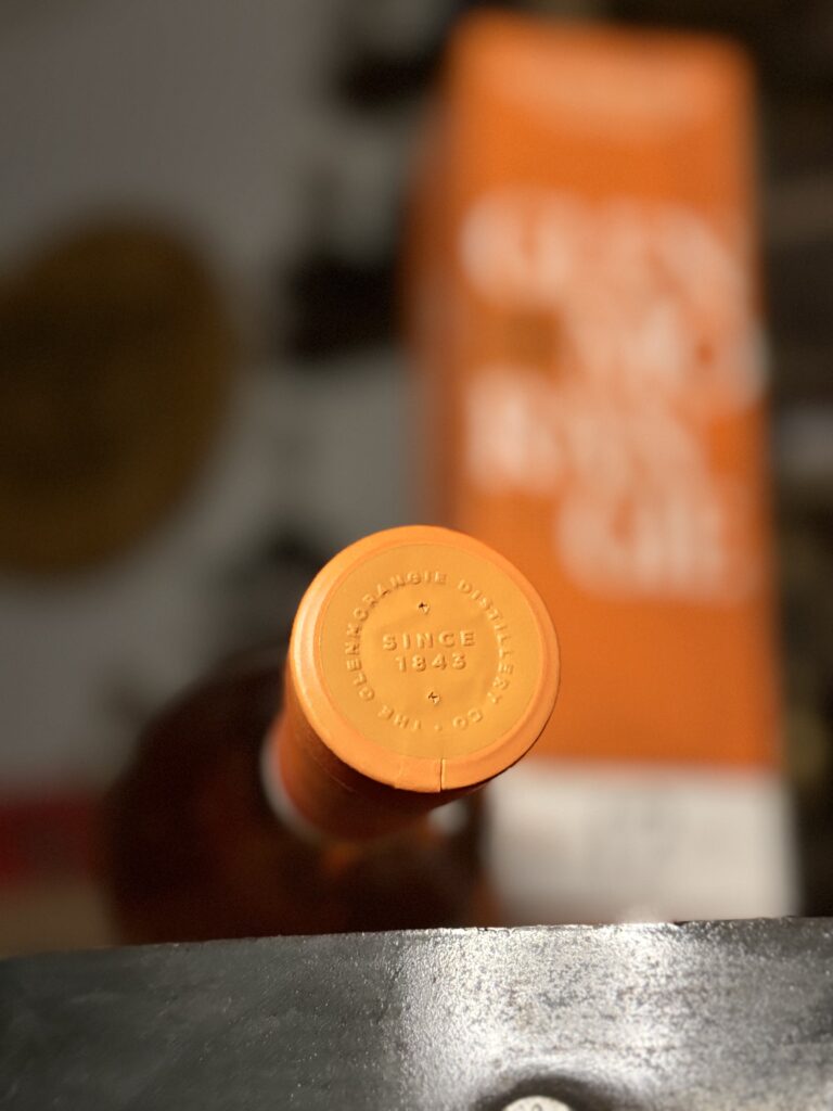 Glenmorangie "The Original" 12 Yr focus on topper with box blurred in background