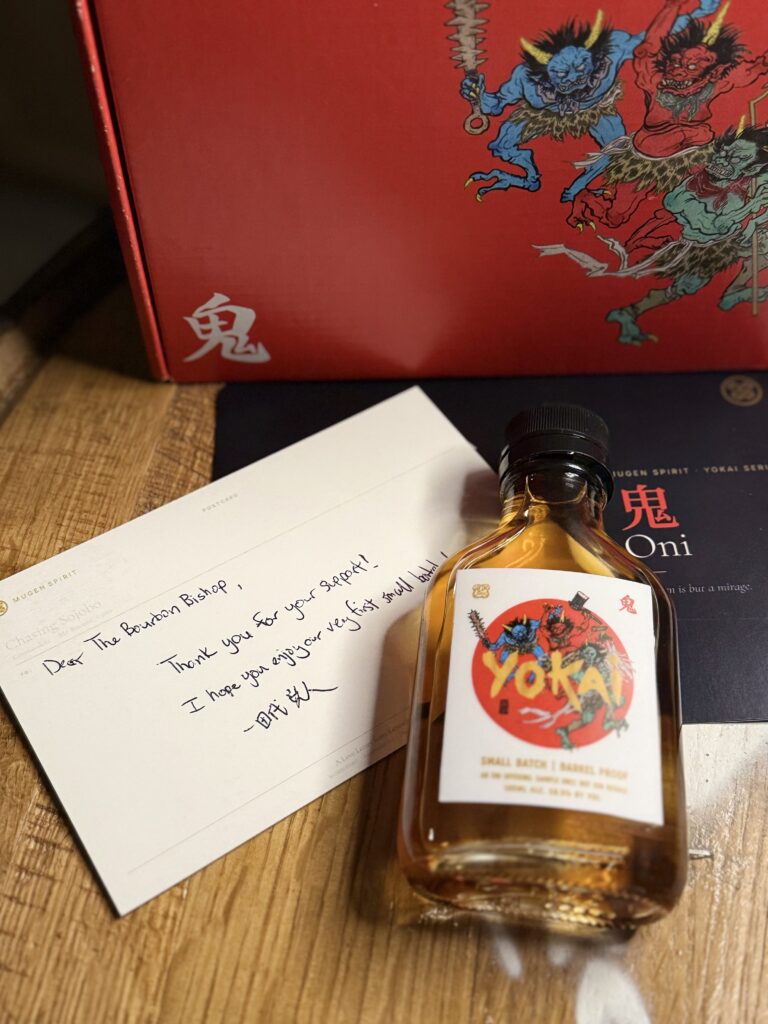Mugen Oni Barrel Proof Small Batch sample lying on handwritten note from founder/curator Kojin Tashiro