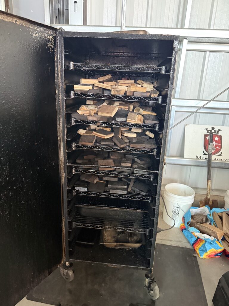 Recycled oak staves from barrels are smoked before being added in large infusion bags to whiskey sitting in new oak (non charred) barrels to create their Smokehouse whiskey