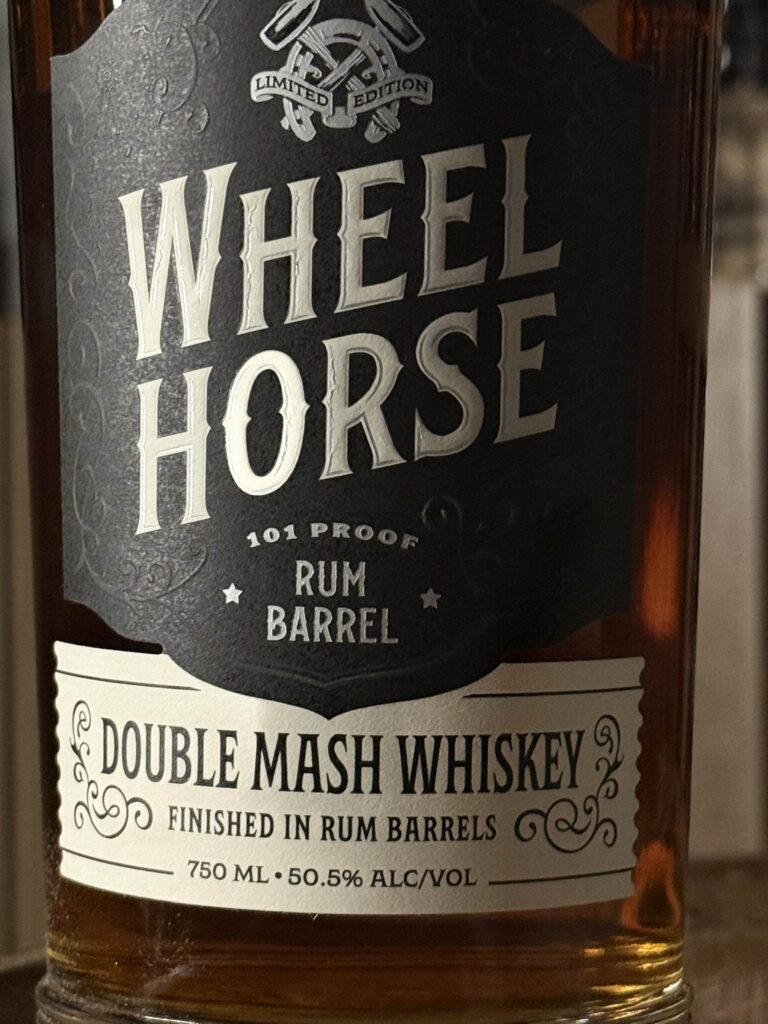 Wheel Horse's new 2026 release, a Double Mash Rum Finished Whiskey label close-up
