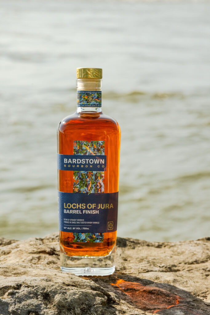Bardstown Bourbon Company Lochs of Jura standing on rocky cliff above ocean
