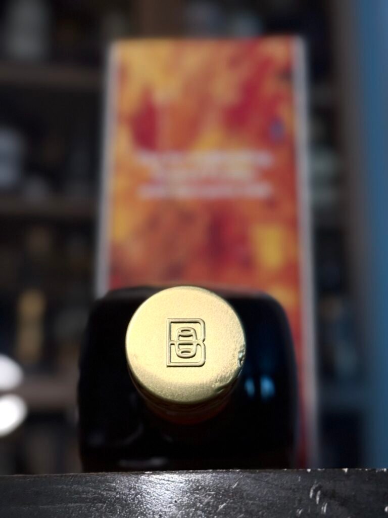 Bardstown Bourbon Company's Discovery 2026 topper with blurred art box in background