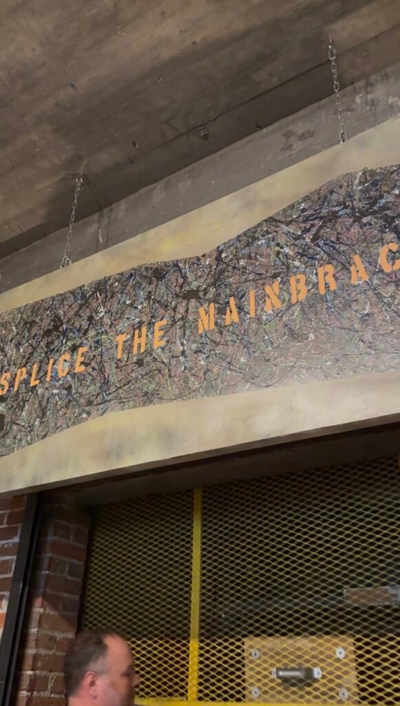 Quote over the lift, "Splice the mainbrace" is an order given aboard naval vessels to issue the crew with an alcoholic drink.