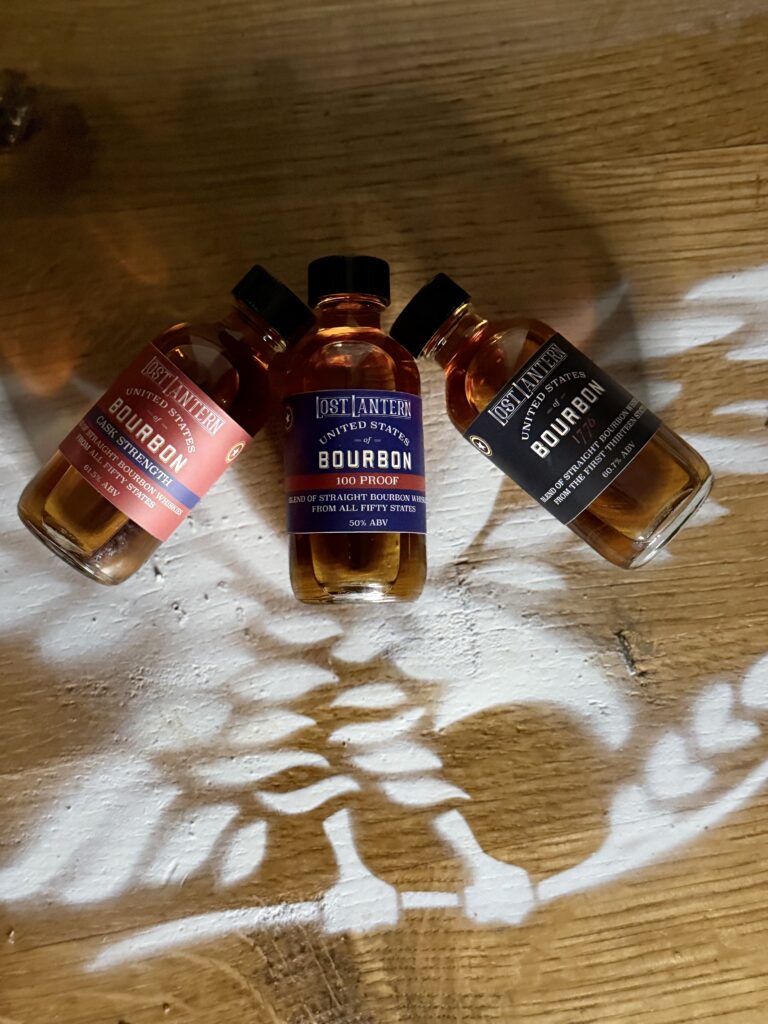 Lost Lantern United States of Bourbon collection samples lying on eagle