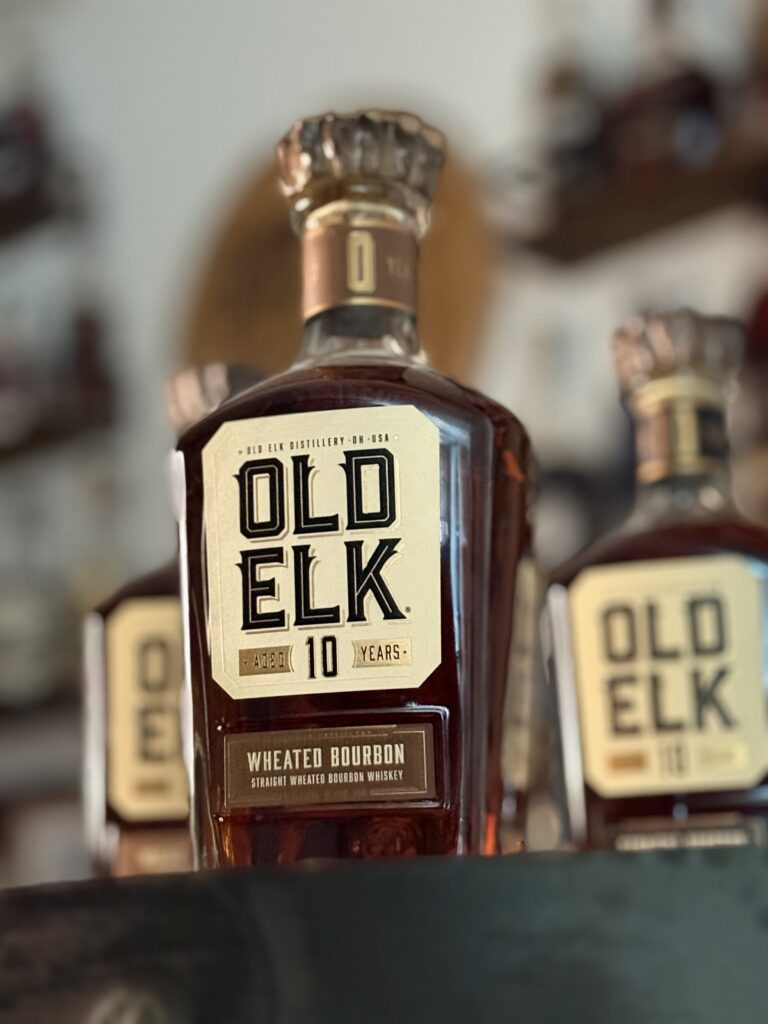 Old Elk 10-Year Wheated Bourbon from lower angle in front of rest of collection