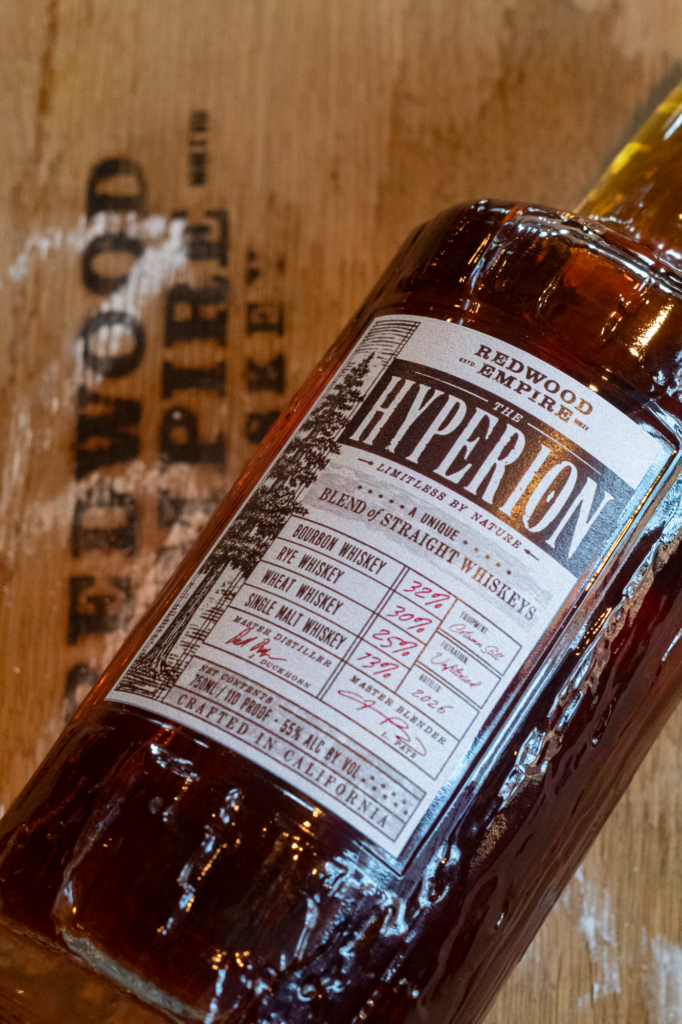 Redwood Empire's newest release "The Hyperion" lying on whiskey barrel head