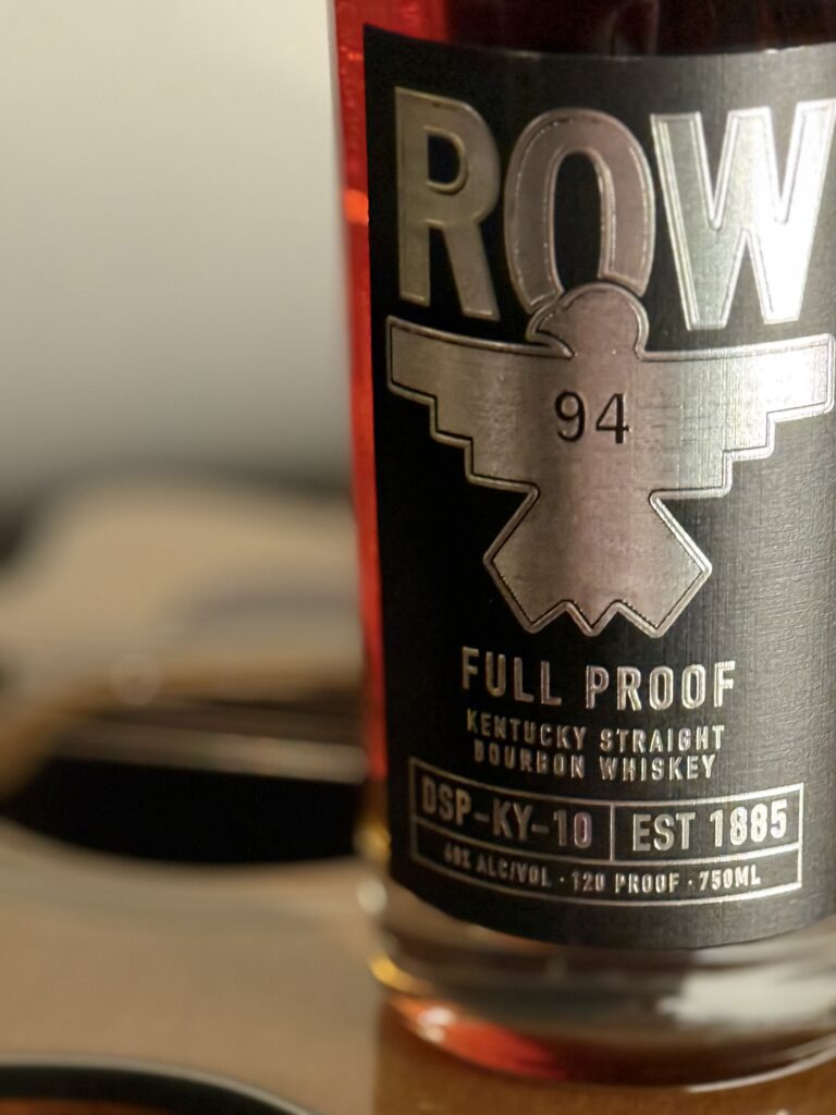 Row 94 Full Proof offset while standing on guitar