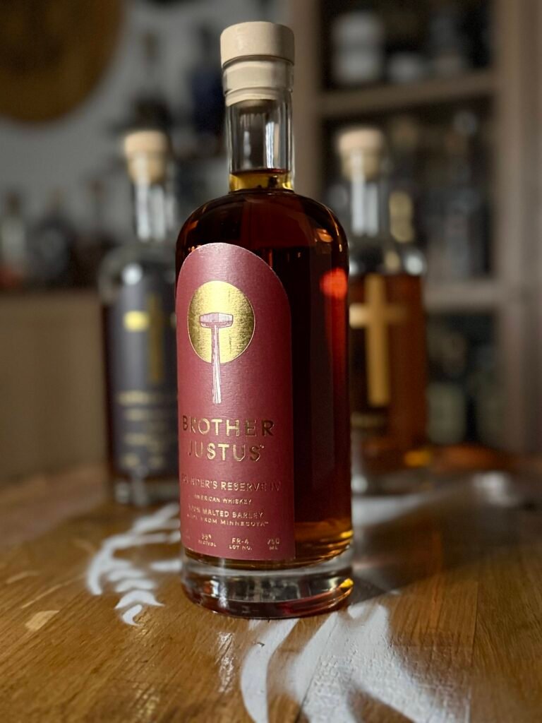 Brother Justus' Founder's Reserve IV angled with past Founder's Reserve lll and ASM releases