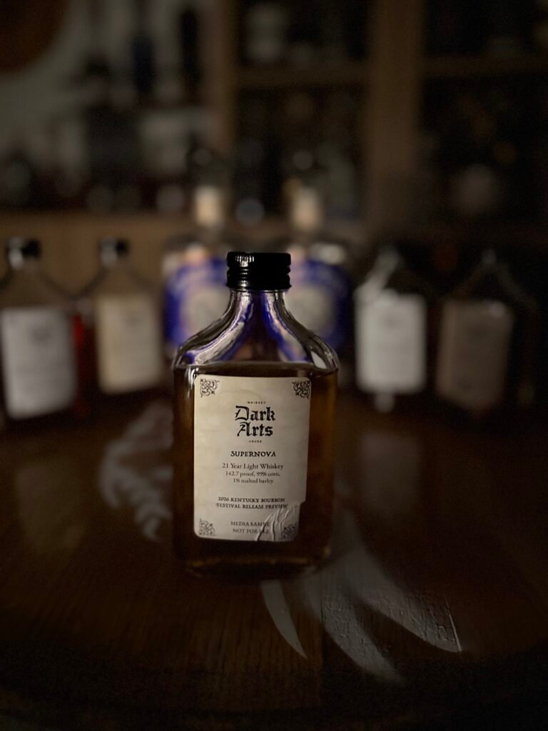 Dark Arts KBF Special Release: "Supernova" 21 Year American Light Whiskey in front of other 5 releases & past finished bottles