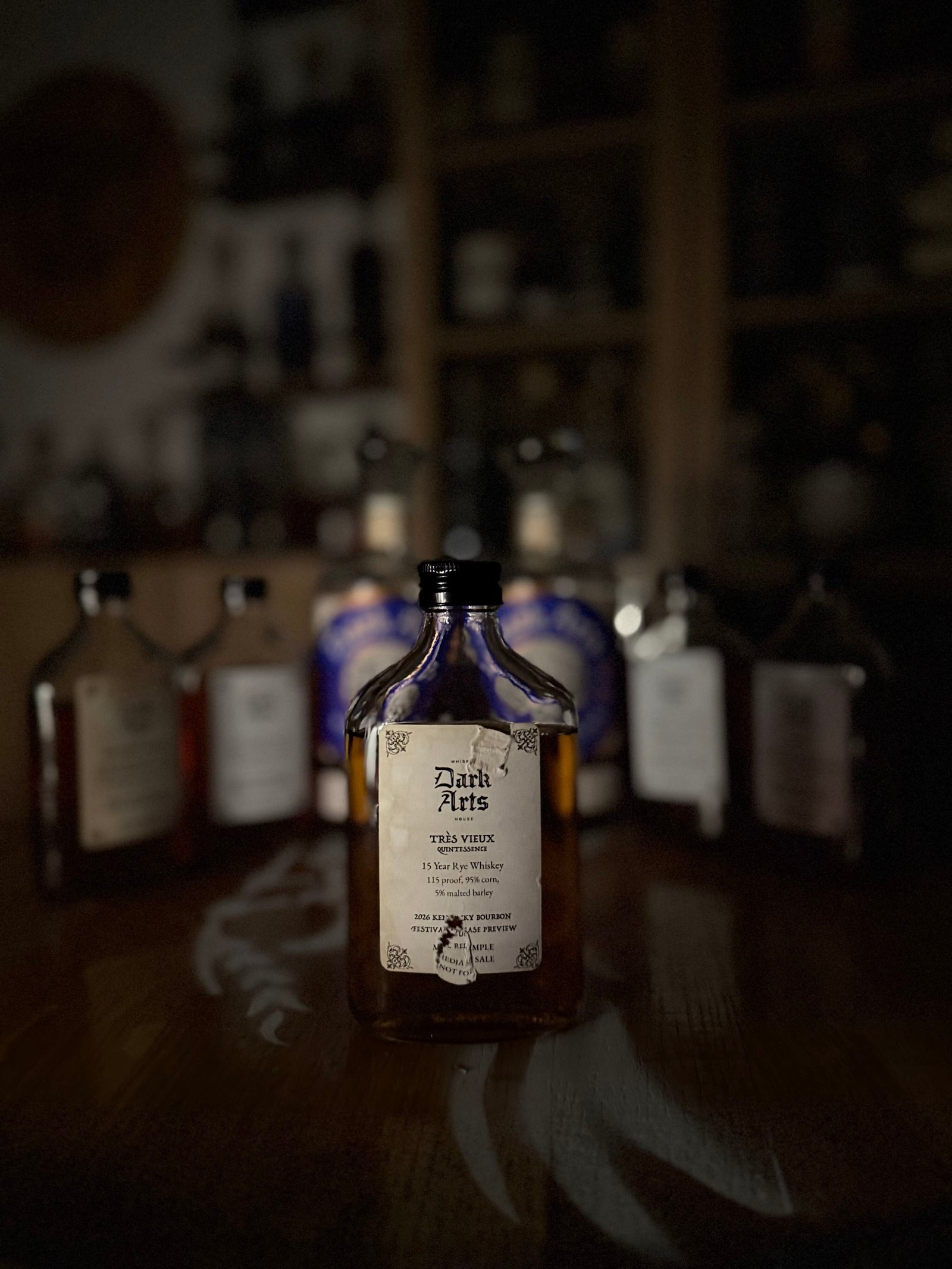 Dark Arts KBF Special Release: "Tres Vieux" 15 Year Rye in front of other 5 releases & past finished bottles