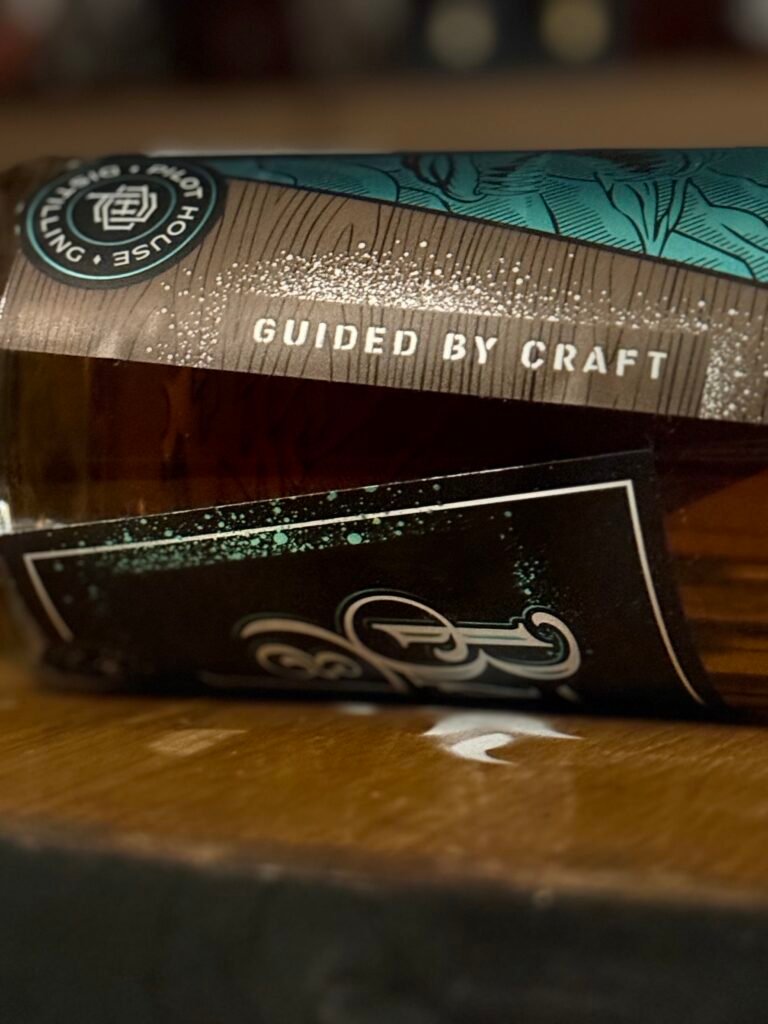 Close-up of Pilot House's Barrel & Tide quote "guided by craft"