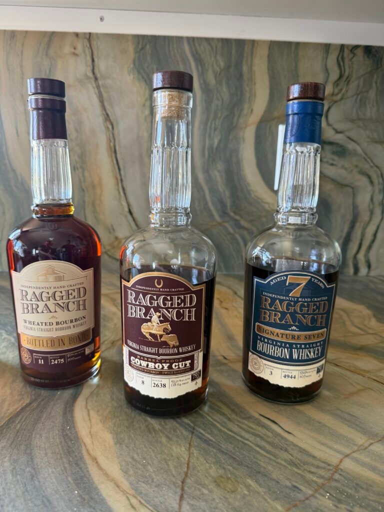 Line-up of three with the Wheated bottled-in-bond, the Cowboy Cut and the Signature Seven