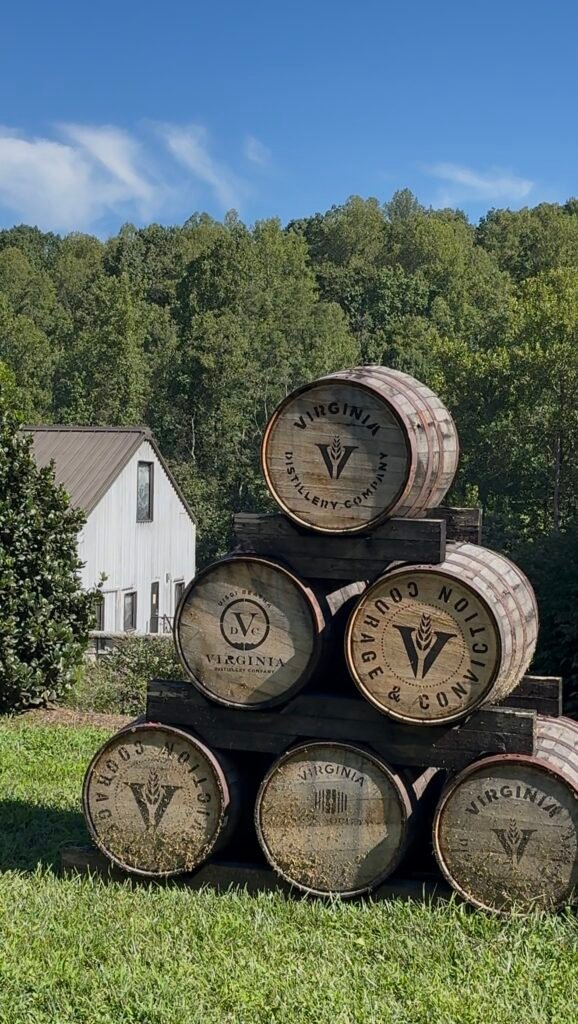 Barrel stack between the visitor center/tasting room and the still house