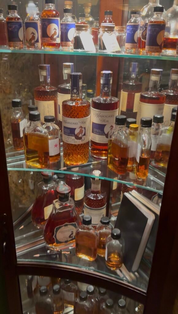 Samples in glass cabinet inside Mahogany Fox