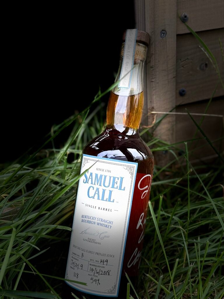 Spotlight on Samuel Call Barrel 3 as it leans against wooden wall