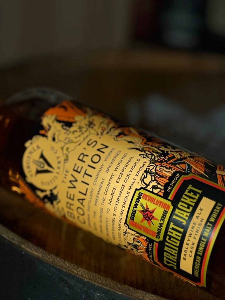 Virgina Distilling Co's "Straightjacket" barleywine finished American single malt lies on whiskey barrel head